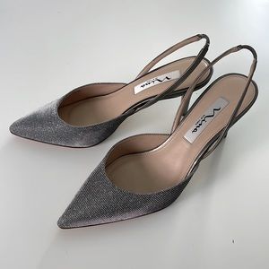 Nina kitten heel sling backs. Size 7.  Never worn with original box.  Beautiful.